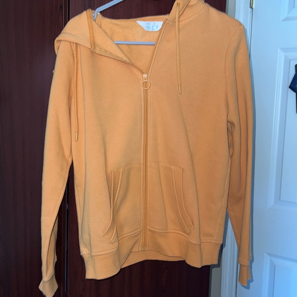 primark soft orange color sweater with soft pockets